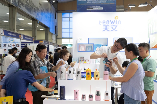 Visitors at the first VietOffice exhibition in Hanoi in May 2024