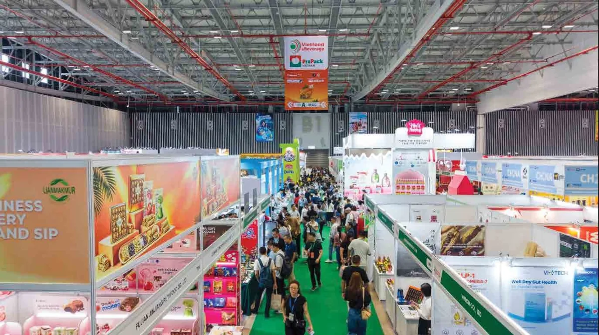 Exhibition aisle with food booths at Vietfood Ho Chi Minh City 2026