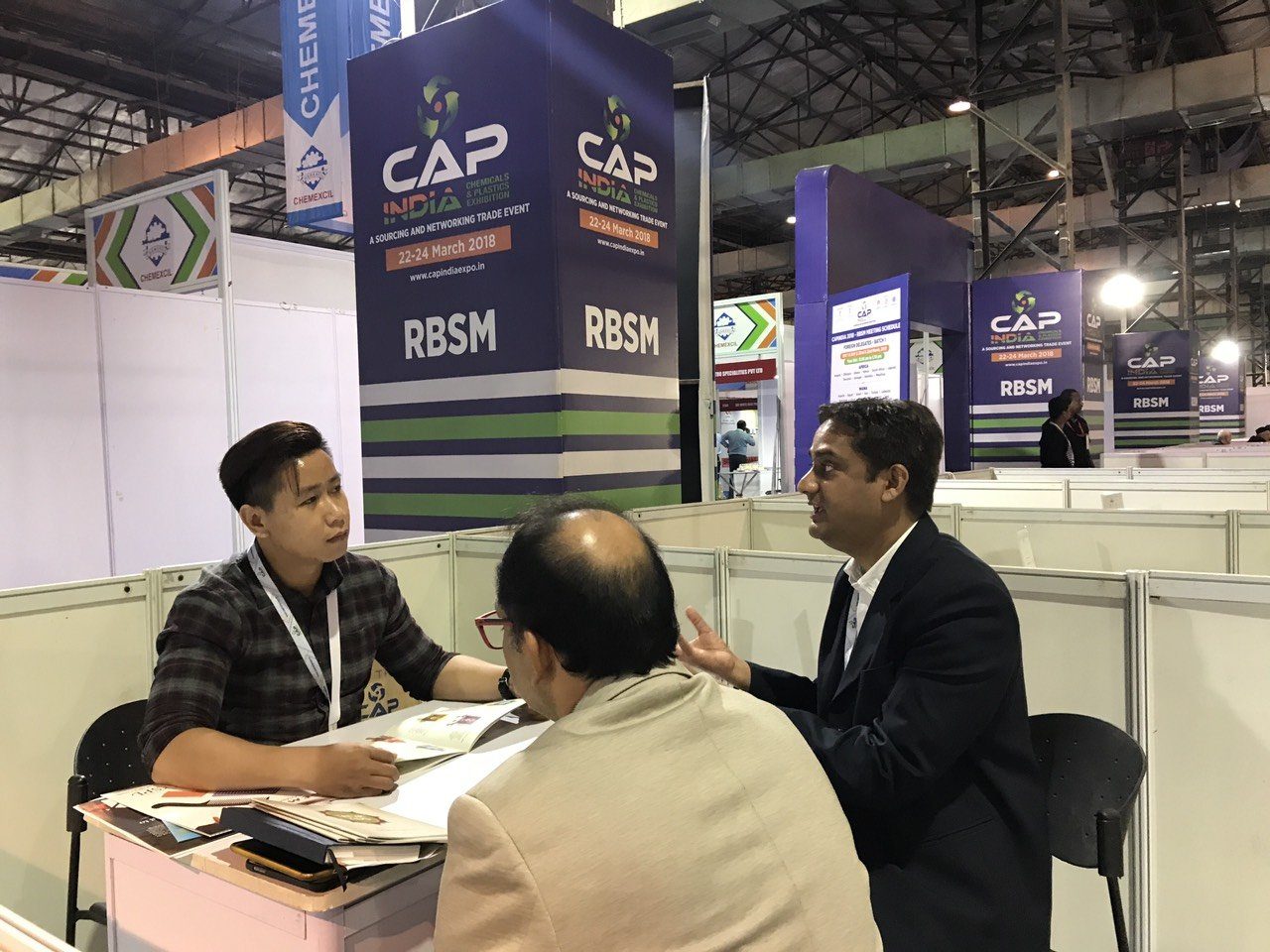 Maximillien Quan Pham negotiating with buyers at the CAP India trade show, March 2018
